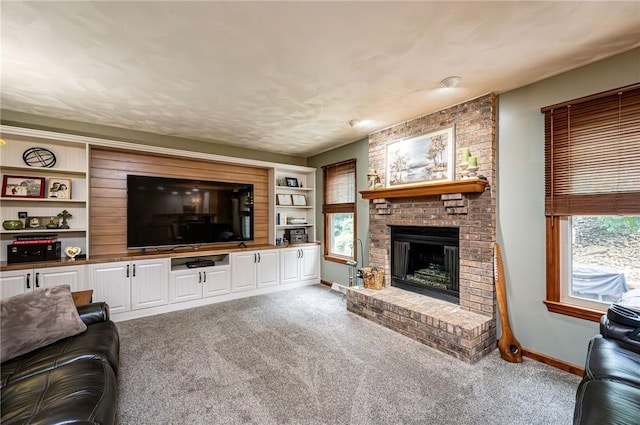 4025 Holiday Park Dr, Murrysville, PA 15668 - living area featuring carpet, a brick fireplace, and plenty of natural light