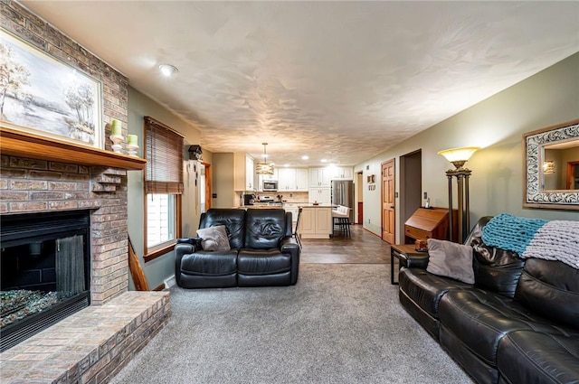 4025 Holiday Park Dr, Murrysville, PA 15668 - living area with dark carpet and a fireplace