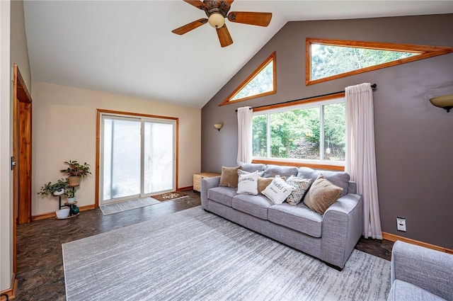 4025 Holiday Park Dr, Murrysville, PA 15668 - living area with high vaulted ceiling, ceiling fan, healthy amount of natural light, and stone finish flooring