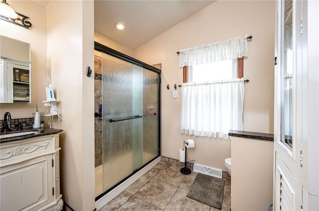 4025 Holiday Park Dr, Murrysville, PA 15668 - full bathroom featuring a shower stall, vanity, tile patterned floors, and recessed lighting