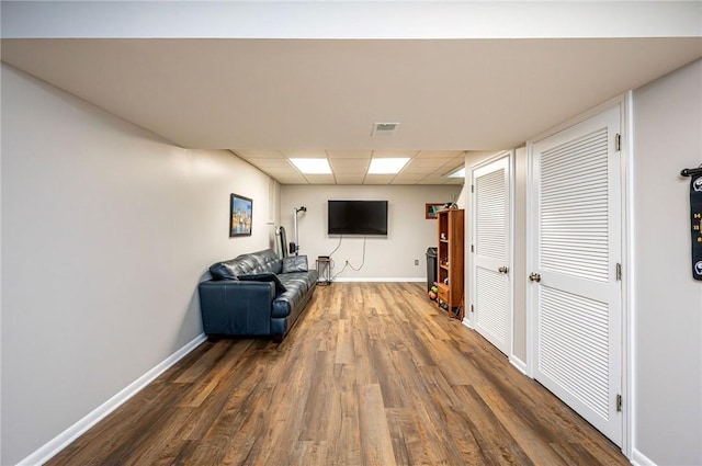 4025 Holiday Park Dr, Murrysville, PA 15668 - living room with wood finished floors and a drop ceiling
