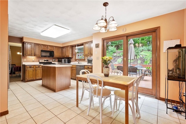 2507 Sarah Ct, Murrysville, PA 15668 - dining area featuring light tile patterned floors and a chandelier