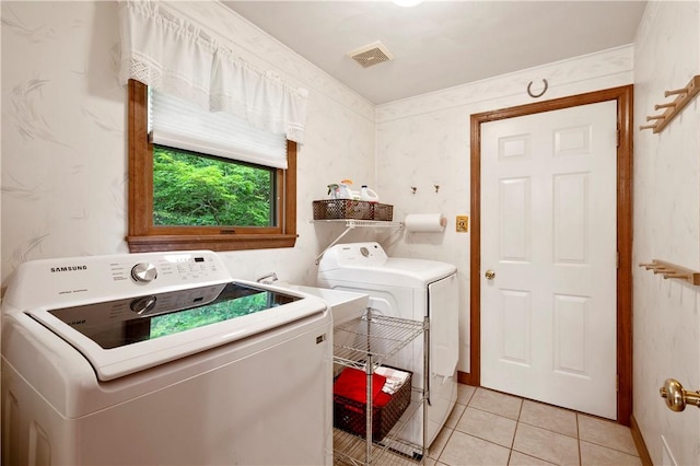2507 Sarah Ct, Murrysville, PA 15668 - laundry room featuring washer and dryer and light tile patterned floors