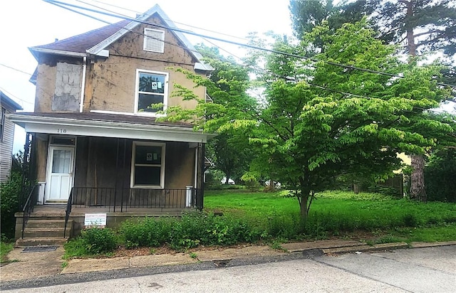 118 Brady Ave, City Of Washington, PA 15301 - view of front facade with a porch and stucco siding