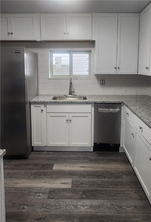118 Brady Ave, City Of Washington, PA 15301 - kitchen featuring appliances with stainless steel finishes, white cabinets, and light stone counters
