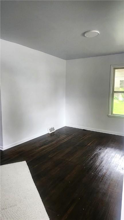 118 Brady Ave, City Of Washington, PA 15301 - spare room featuring dark wood-style floors and baseboards