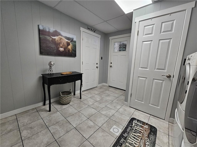 15 Pineview Ests, Sewickley Twp, PA 15089 - entryway featuring light tile patterned floors and washer and dryer