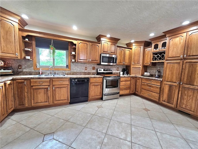 15 Pineview Ests, Sewickley Twp, PA 15089 - kitchen featuring stainless steel appliances, open shelves, brown cabinetry, decorative backsplash, and light tile patterned flooring