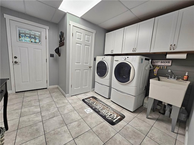 15 Pineview Ests, Sewickley Twp, PA 15089 - laundry area featuring washer and dryer, cabinet space, and light tile patterned floors