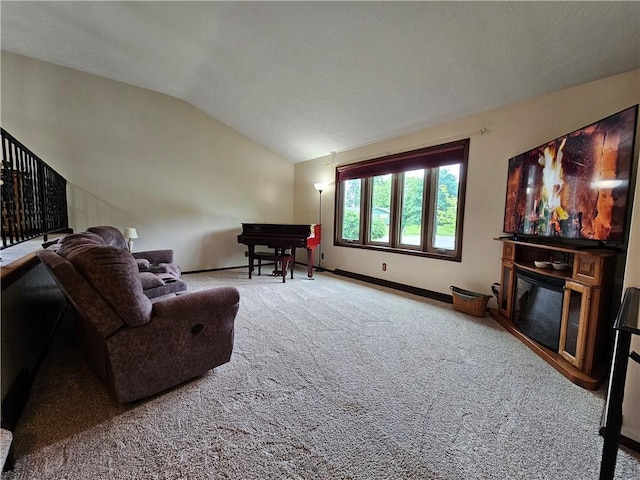 15 Pineview Ests, Sewickley Twp, PA 15089 - living area with carpet floors, lofted ceiling, and a glass covered fireplace