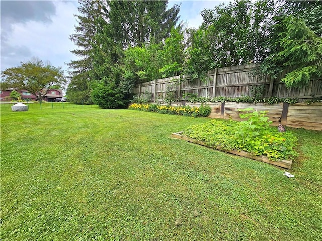15 Pineview Ests, Sewickley Twp, PA 15089 - fenced backyard with a vegetable garden