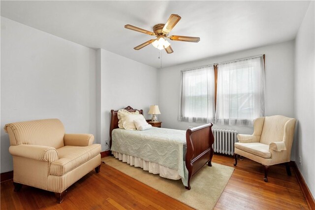 1223 Ingham St, Marshall Shadeland, PA 15212 - bedroom featuring radiator, wood finished floors, and a ceiling fan