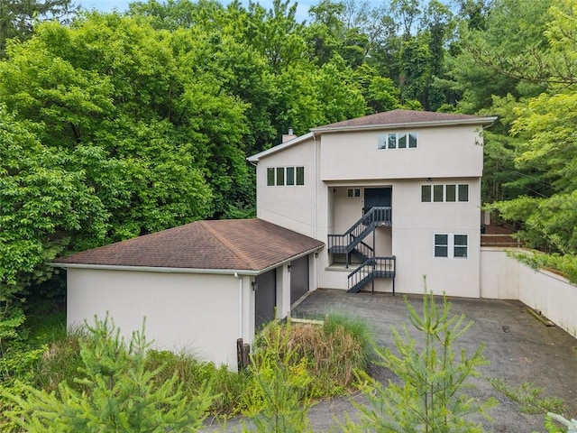 1251 Glencoe Ave, Green Tree, PA 15205 - rear view of property featuring stucco siding and stairway
