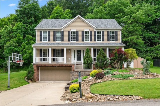 54 Colony Oaks Dr, Shaler, PA 15209 - colonial house with covered porch, driveway, a front lawn, a garage, and roof with shingles