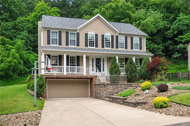 54 Colony Oaks Dr, Shaler, PA 15209 - colonial inspired home featuring a porch, concrete driveway, an attached garage, and a chimney