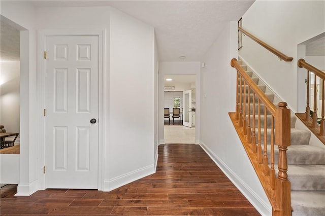 54 Colony Oaks Dr, Shaler, PA 15209 - corridor with wood finished floors and stairway
