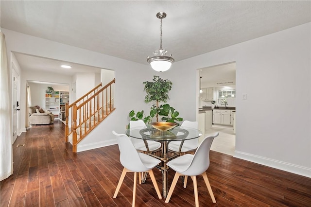54 Colony Oaks Dr, Shaler, PA 15209 - dining area featuring stairs and wood finished floors