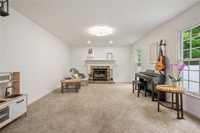 54 Colony Oaks Dr, Shaler, PA 15209 - sitting room featuring light carpet, plenty of natural light, a fireplace, and recessed lighting