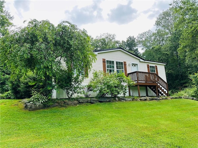 170 Hungarian Rd, Cherry Twp, PA 16057 - back of property featuring a deck, a lawn, and stairway