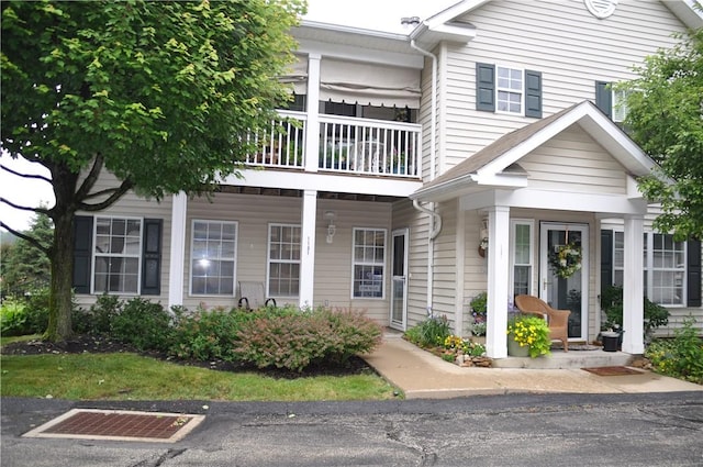 1101 Lenox Dr, Bethel Park, PA 15102 - view of front facade with a balcony and covered porch