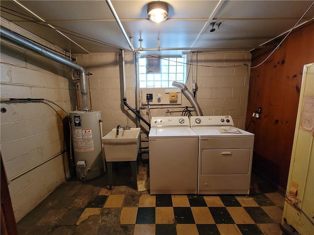 5510 Pocusset St, Squirrel Hill, PA 15217 - laundry area featuring gas water heater, washer and clothes dryer, and tile patterned floors