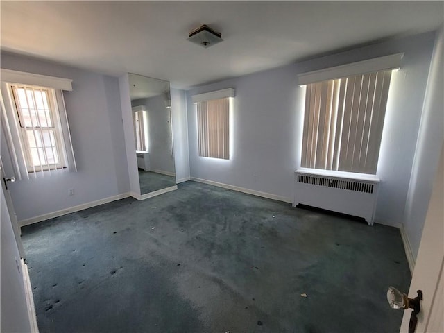 5510 Pocusset St, Squirrel Hill, PA 15217 - unfurnished bedroom featuring radiator and carpet