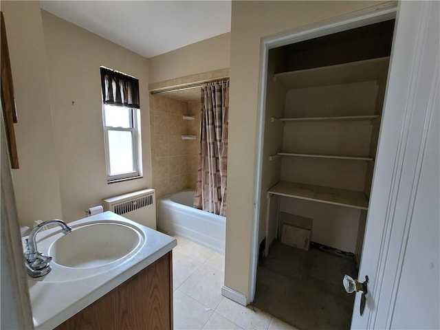 5510 Pocusset St, Squirrel Hill, PA 15217 - full bathroom featuring radiator, tile patterned flooring, shower / tub combo with curtain, and vanity