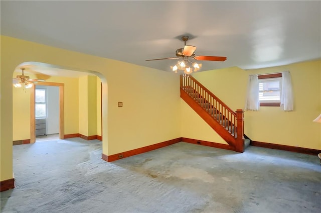 83 Evans Ave, Ingram, PA 15205 - spare room with ceiling fan, arched walkways, and carpet flooring