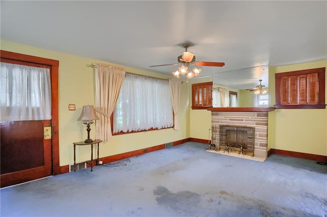 83 Evans Ave, Ingram, PA 15205 - unfurnished living room with a stone fireplace and a ceiling fan