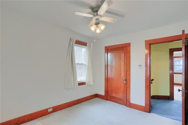 83 Evans Ave, Ingram, PA 15205 - unfurnished bedroom featuring multiple windows, carpet floors, and a ceiling fan