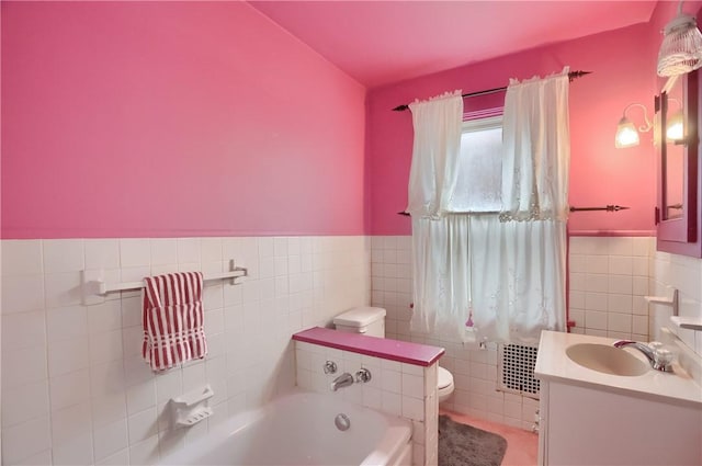 83 Evans Ave, Ingram, PA 15205 - full bathroom with tile walls, a garden tub, vanity, and a wainscoted wall