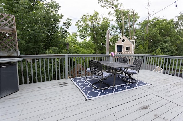 1632 Norwalk St, Crafton Heights, PA 15205 - deck featuring outdoor dining area and view of wooded area