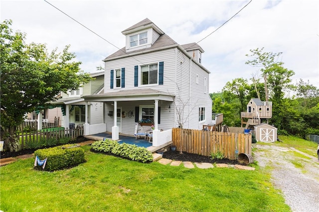 1632 Norwalk St, Crafton Heights, PA 15205 - american foursquare style home featuring a storage unit and covered porch