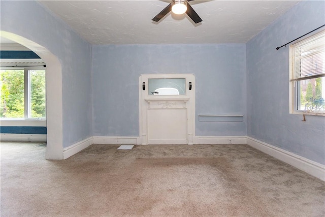 1632 Norwalk St, Crafton Heights, PA 15205 - carpeted foyer entrance with a ceiling fan and arched walkways