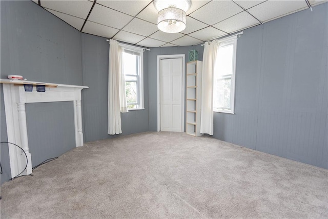 1632 Norwalk St, Crafton Heights, PA 15205 - unfurnished living room with carpet, a paneled ceiling, and a decorative wall