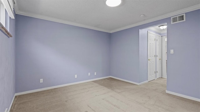 6623 Saltsburg Rd, Penn Hills, PA 15235 - carpeted empty room featuring a textured ceiling, crown molding, and a smoke detector