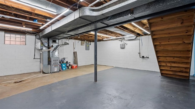 6623 Saltsburg Rd, Penn Hills, PA 15235 - below grade area with heating unit, electric panel, and concrete block wall