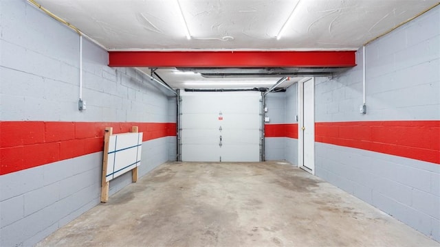 6623 Saltsburg Rd, Penn Hills, PA 15235 - garage featuring concrete block wall