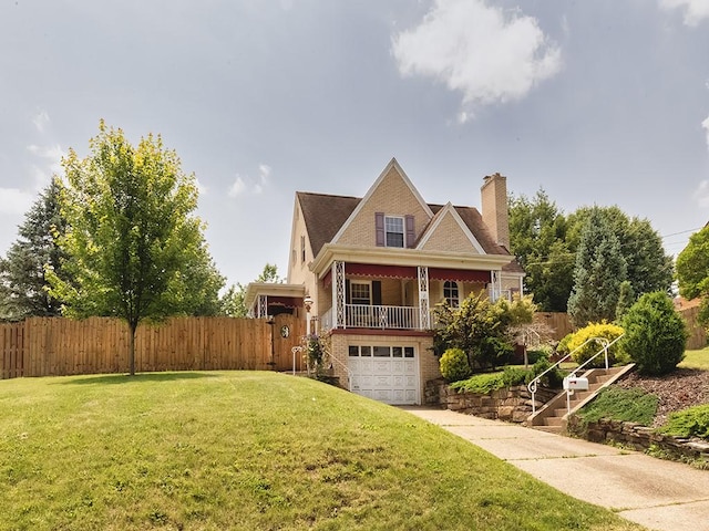 449 Woodland Rd, Canonsburg, PA 15317 - view of front of home with a chimney, an attached garage, driveway, and brick siding