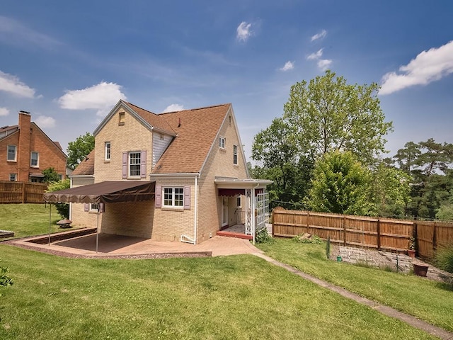 449 Woodland Rd, Canonsburg, PA 15317 - back of property with a patio area, a fenced backyard, and brick siding