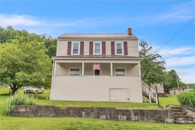 104 Highland Ave, Avella, PA 15312 - view of side of property with a chimney, covered porch, a yard, and stairs