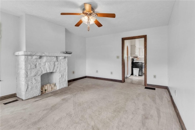104 Highland Ave, Avella, PA 15312 - unfurnished living room with a ceiling fan, carpet floors, and a stone fireplace