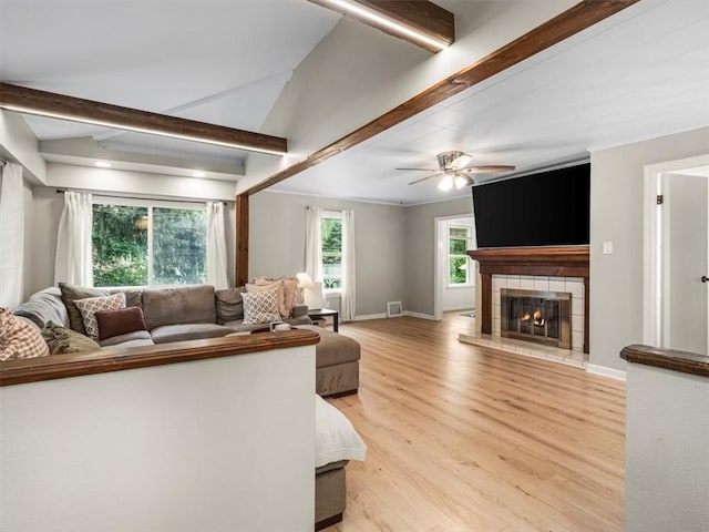 537 Ambridge Ave, Leet Twp, PA 15003 - living room featuring light wood-style flooring, a tile fireplace, and ceiling fan