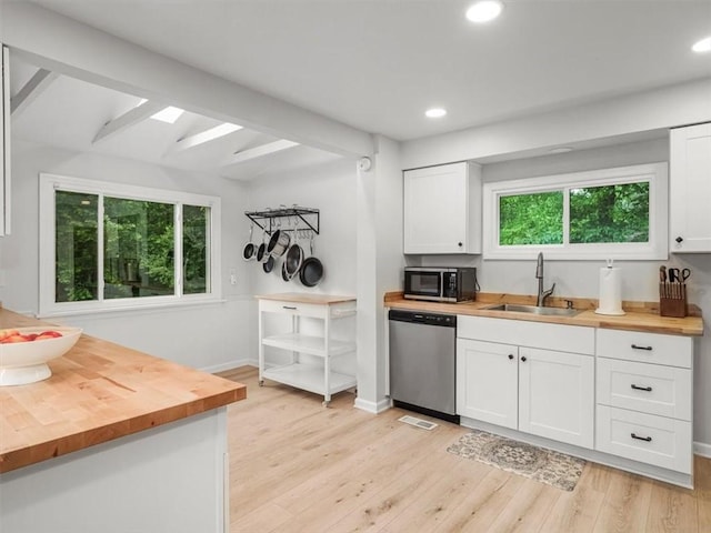 537 Ambridge Ave, Leet Twp, PA 15003 - kitchen featuring butcher block counters, appliances with stainless steel finishes, healthy amount of natural light, white cabinets, and recessed lighting