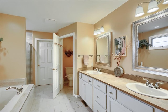 143 Hampshire Dr, Cranberry Twp, PA 16066 - bathroom with double vanity, a garden tub, a shower stall, and tile patterned floors