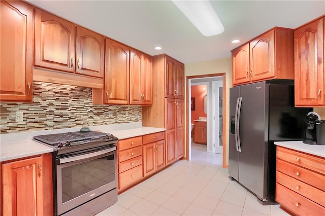 143 Hampshire Dr, Cranberry Twp, PA 16066 - kitchen featuring stainless steel appliances, light countertops, backsplash, and recessed lighting