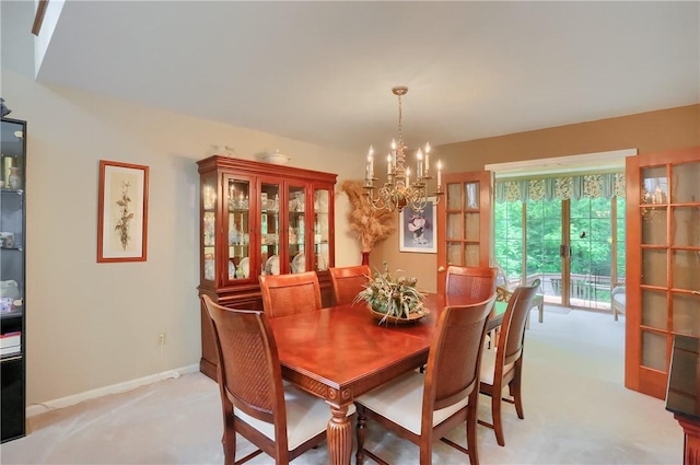 143 Hampshire Dr, Cranberry Twp, PA 16066 - dining area with a chandelier and light colored carpet