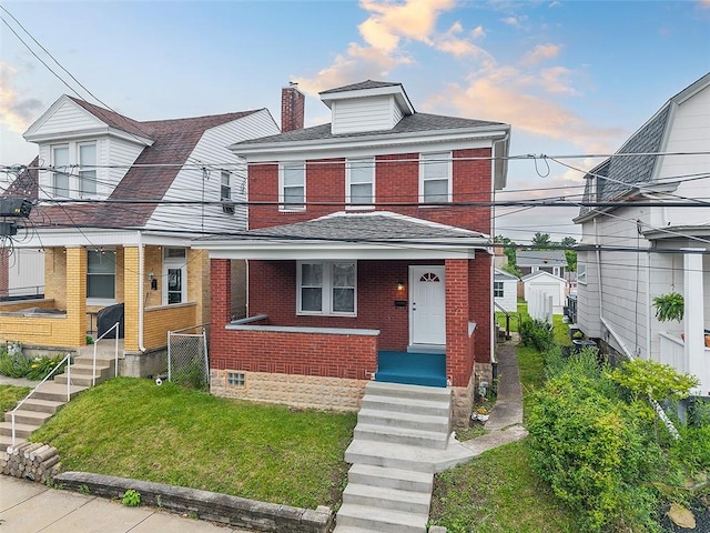 1014 Fordham Ave, Brookline, PA 15226 - traditional style home with brick siding, covered porch, a chimney, and roof with shingles