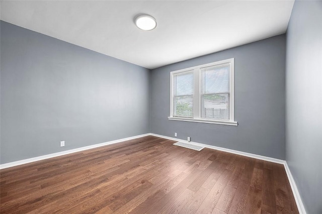 1014 Fordham Ave, Brookline, PA 15226 - spare room featuring dark wood-style floors and baseboards