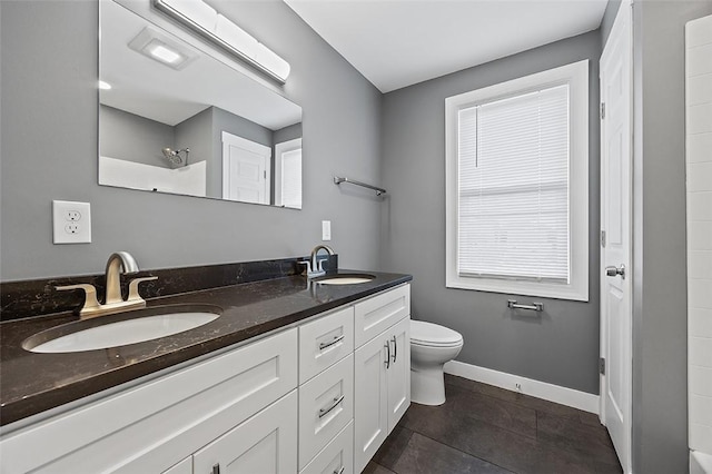 1014 Fordham Ave, Brookline, PA 15226 - full bathroom with double vanity, tile patterned floors, and a shower